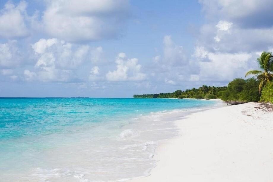 Fotografie Grand Beach Dhigurah Guest House гостиный двор